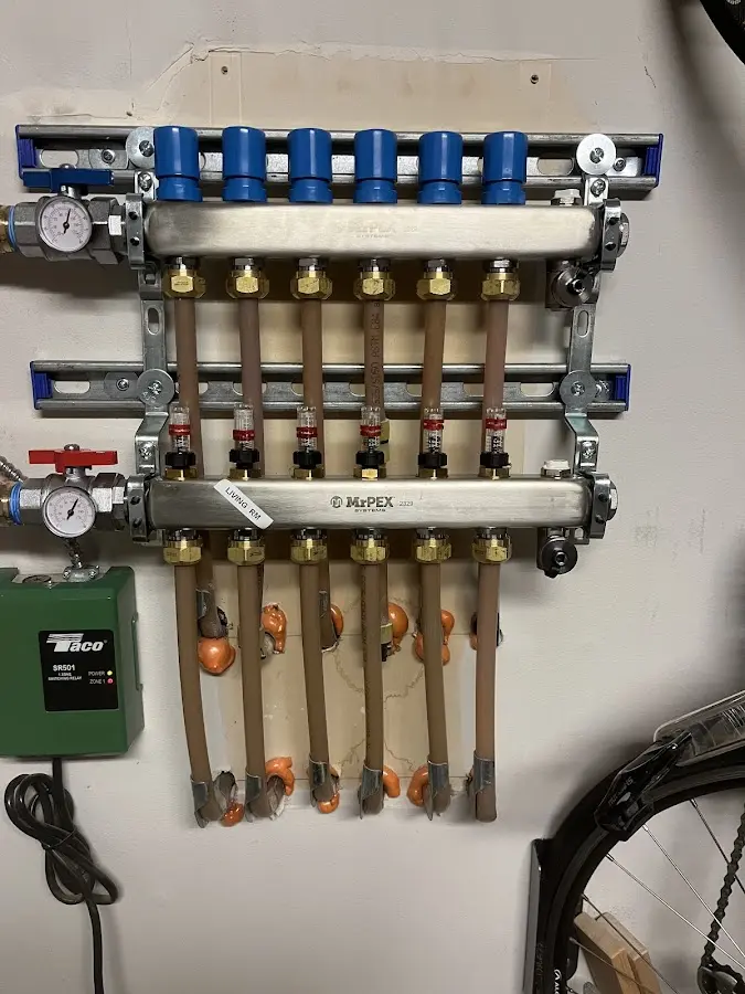 Plumber performing Water Heater Repair at a residential property in Jackson